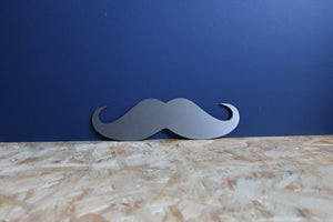 metal moustache sign