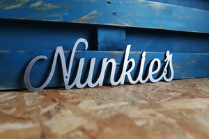 Nunkie's custom word mild steel metal sign